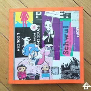 Cover des Skizzenbuch mit vielen sehr bunten übereinandergeklebten Stickern.