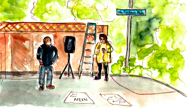 Watercolor Sketch, two people with microphone and amplifier are in front of a wooden wall at the end of Von-Erkert-Platz