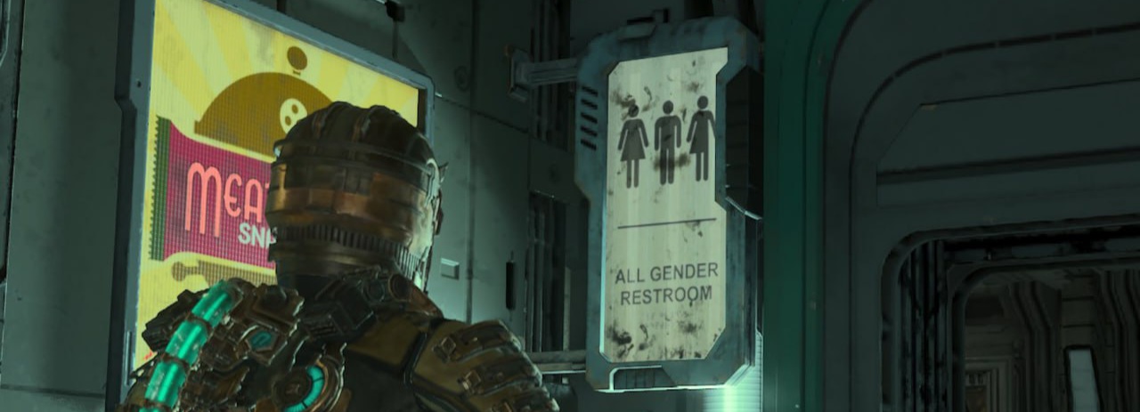 Screenshot aus dem Spiel, Mensch in messingfarbener militärischer Ganzkörpermontur steht vor einem Schild mit drei Symbolmenschen (mit Rock, ohne Rock, Rock nur links) und dem Text: All Gender Restroom.