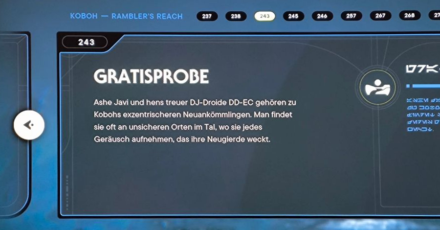 Schreenshot aus dem Video Game. In einem großen grauen Kasten der Text mit dem Titel Gratisprobe: Ashe Javi und hens treuer DJ-Droide DD-EC gehören zu Kobohs exzentrischerem Neuankömmlingen. Man findet sie oft an unsicheren Orten im Tal, wo sie jedes Geräusch aufnehmen, das ihre Neugierde weckt.